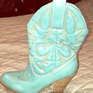 Turquoise colored cowgirl boots